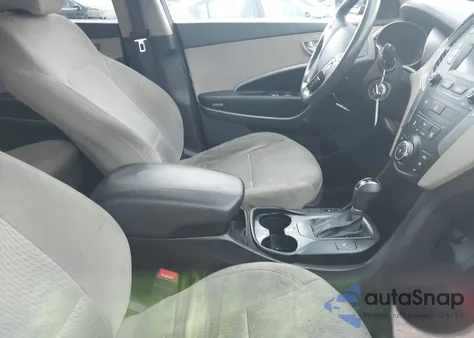 2015 Hyundai Santa Fe Sport 2.4L z USA, uszkodzony, nr VIN 5XYZUDLB4FG300272